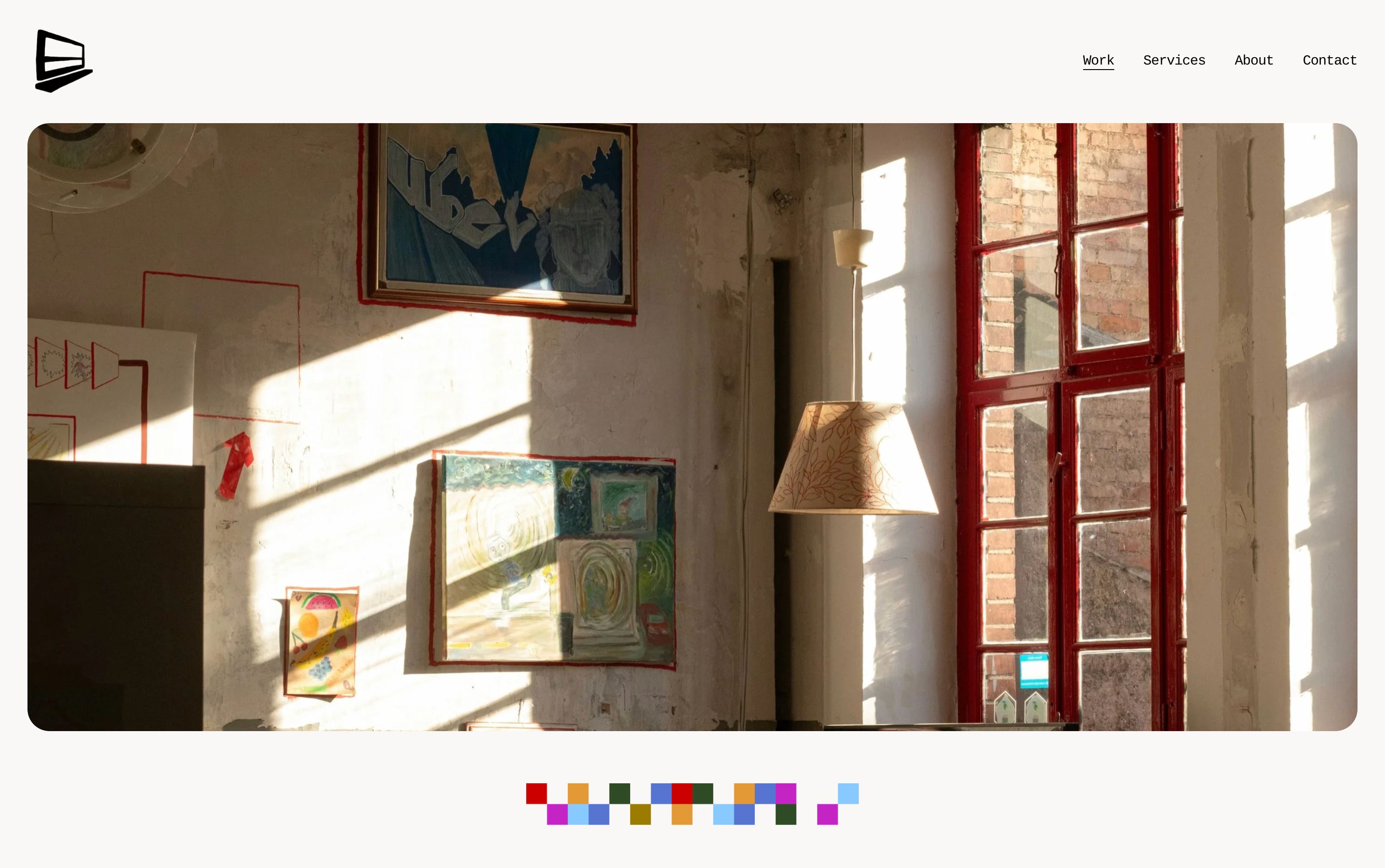 CAMZYN Studio workspace with sunlight streaming through windows